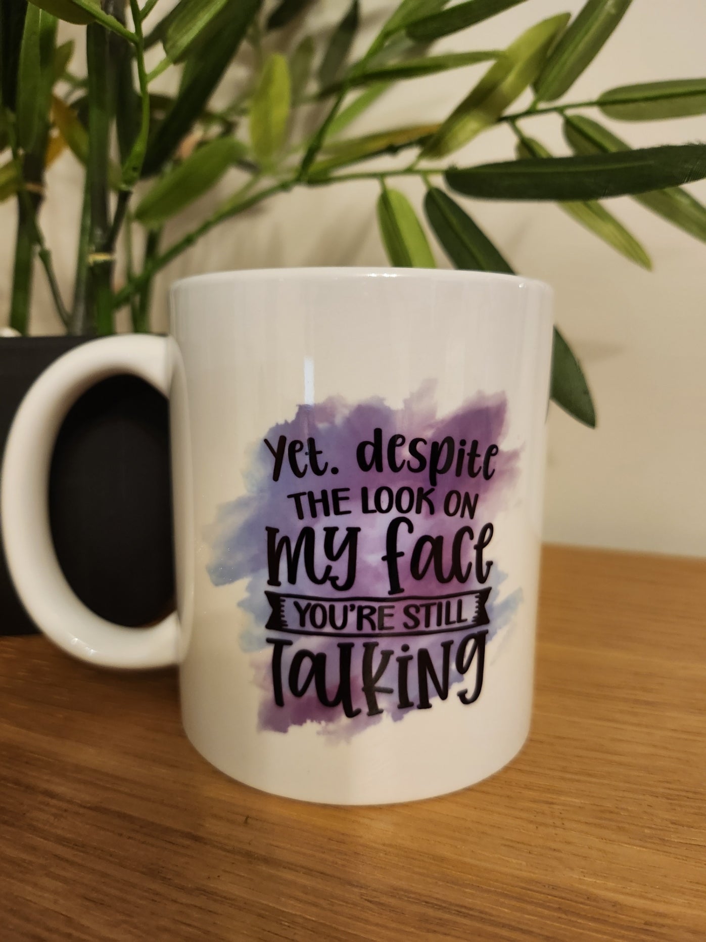 'Yet Despite the Look on my Face' Mug