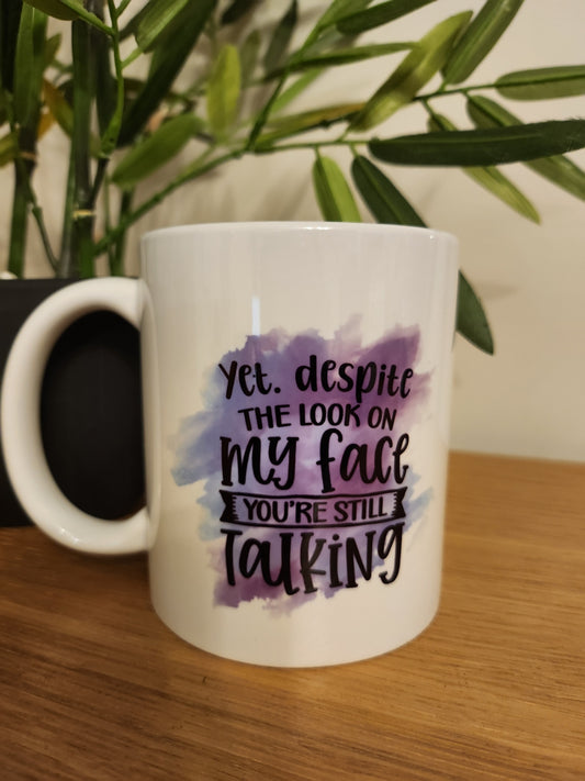 'Yet Despite the Look on my Face' Mug